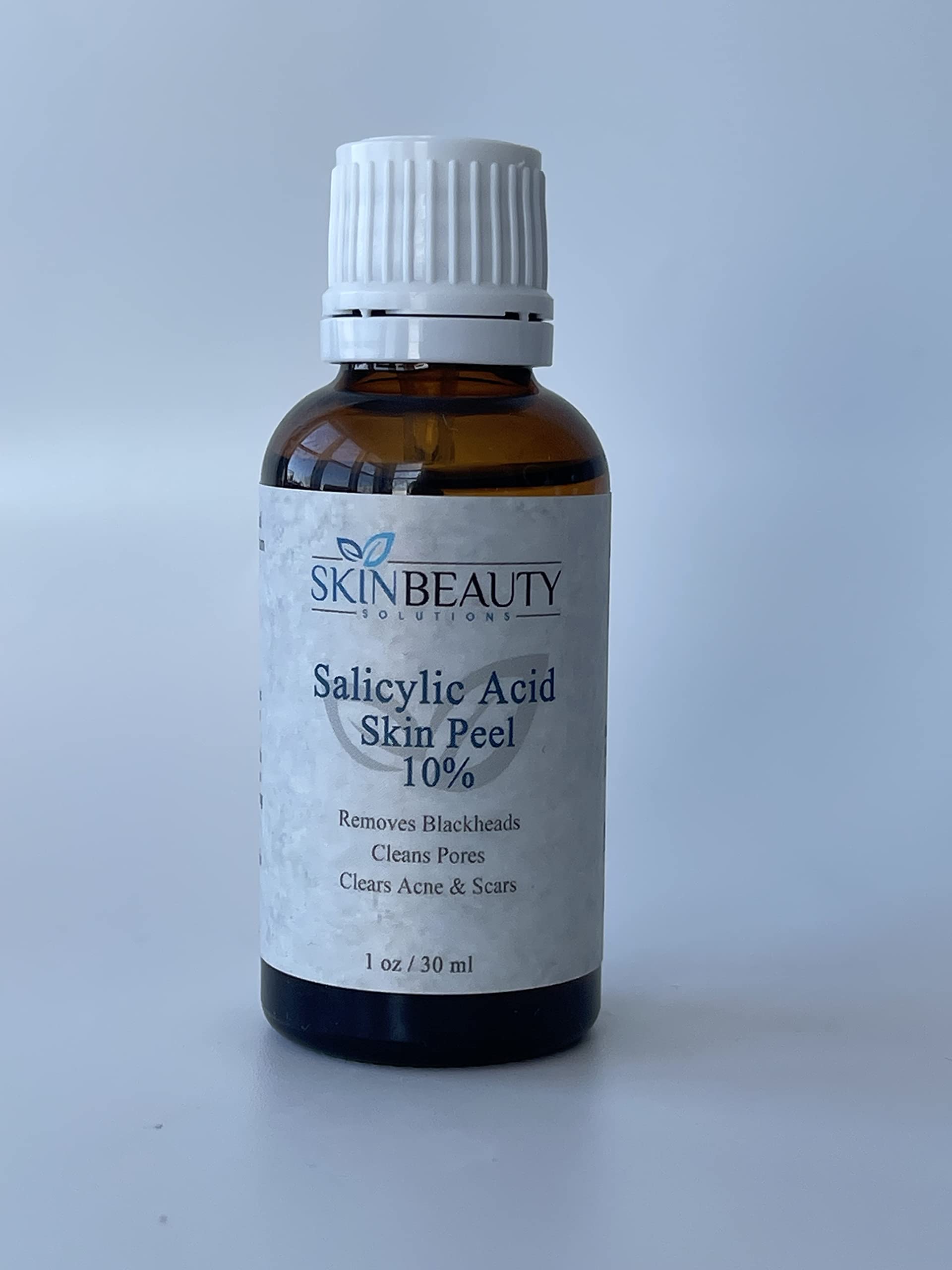 A chemical peel solution bottle.