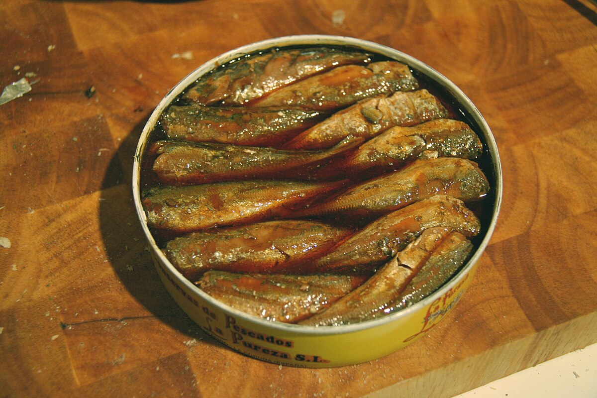 Seafood varieties such as salmon, sardines, and cod.